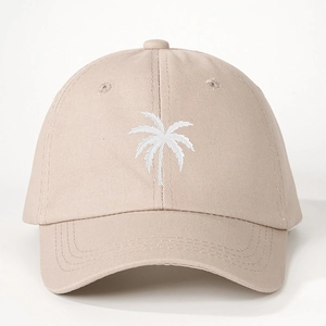 Beige baseball cap with white palm tree embroidery and adjustable strap