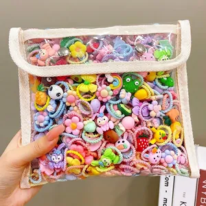 Bulk set of cute colorful hair ties for girls featuring cartoon and fruit motifs