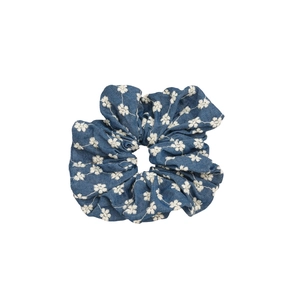 Blue denim fabric scrunchie with white floral embroidery for elegant women hairstyle