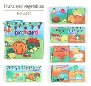 Macro detail of tear-resistant baby cloth book showing colorful fruits and vegetables