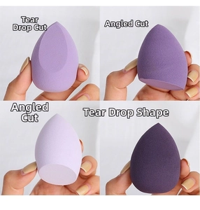 Detailed view of various purple makeup sponges in teardrop and slanted cut shapes