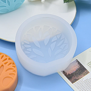 Silicone mold for Tree of Life scented candles and DIY crafts with finished orange wax disc
