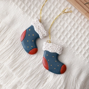 Mini resin Christmas stocking ornaments with golden hanging string for festive tree decor