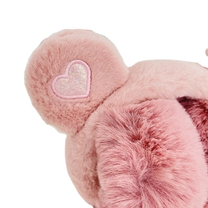 Pink plush winter earmuffs for kids with sparkly sequin heart patch and soft fur texture