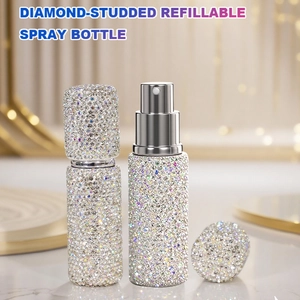 Close-up of a 10ml refillable spray bottle fully encrusted with shimmering rhinestones