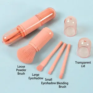 Portable 5-piece coral pink travel makeup brush set with transparent storage cap