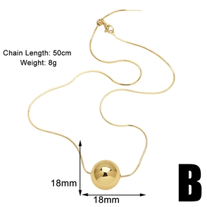 Detailed view of 18mm polished gold spherical pendant on a 50cm snake chain necklace