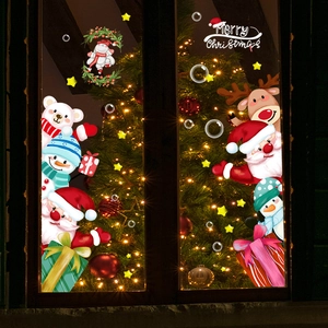 Christmas window stickers featuring Santa, reindeer and snowman with Merry Christmas text