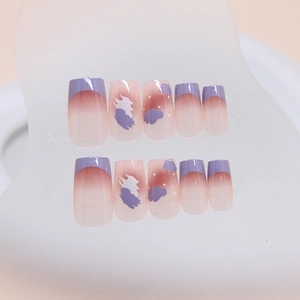 French gradient lavender and reddish brown press-on nails with white cloud patterns