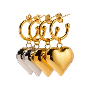 Chic heart-shaped stainless steel earrings in polished gold and silver finishes