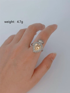 Gothic wings heart ring in silver and gold finish weighing 4.7g on finger