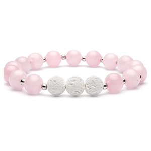 Pink natural stone beads and white lava rock stretch bracelet with silver spacers