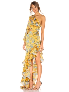 Detail of floral one-shoulder dress with asymmetric ruffled hem and cut-out waist
