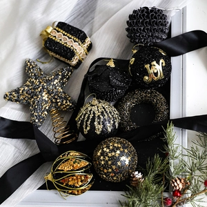 Luxury black and gold Christmas ball ornaments and tree toppers set with glitter finish
