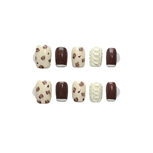 Handmade press-on nails set with brown cow print and white 3D sweater texture