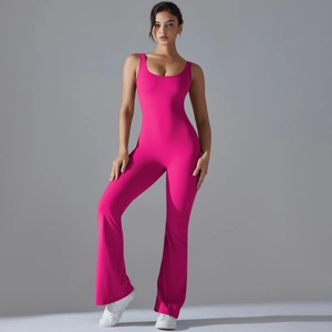 Close-up of pink sleeveless yoga jumpsuit with flared legs and cutout back detail