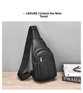 Detail of black textured leather chest bag featuring metallic zipper and kangaroo logo
