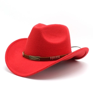 Detailed macro view of a red wool felt cowboy hat featuring a brown braided leather band