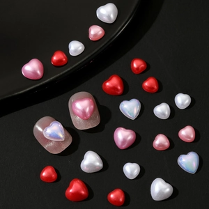 Detailed view of colorful 3D resin heart charms for nail art and phone case accessories