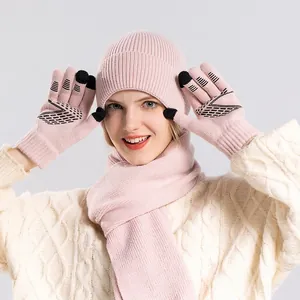 Pink knit set with warm beanie, scarf, and touch-screen gloves for winter outdoor use