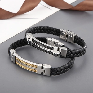 Men's braided leather bracelet with stainless steel gold and gunmetal accents in 45-degree view