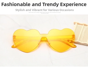 Détail de lunettes de soleil sans monture en forme de cœur jaune transparent
