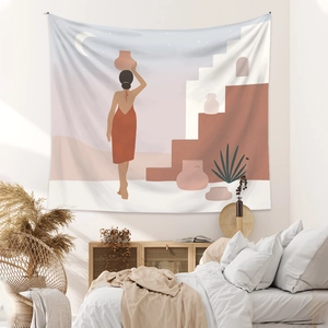 Artistic detail of abstract bohemian tapestry in terracotta and beige on a bedroom wall