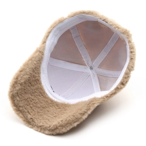 Internal view of plush baseball cap with fleece texture and reinforced seam taping