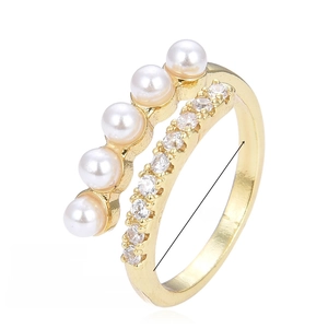 Macro detail of 18k gold plated adjustable ring with pearls and pavé cubic zirconia