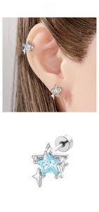 Star-shaped zircon ear stud with silver finish and light blue gemstone in detail view