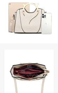 Detail view of beige PU leather handbag with cat-ear metal handles and interior compartments