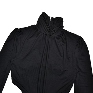 Detail of high collar with ruching and metal back zipper on black slim fit dress