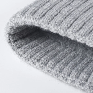 Winter striped ribbed knit beanie with thermal plush lining and ear protection
