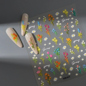 Detail of 5D floral embossed nail stickers featuring daisy patterns and spring motifs