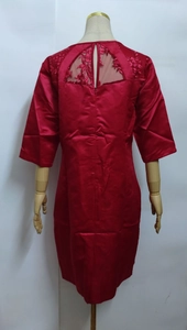 Detail of red lace embroidery and back cutout on the elegant satin plus size dress