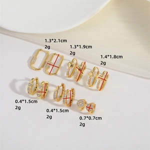 Minimalist gold star heart hoop earrings set with zircon stone inlays on white background