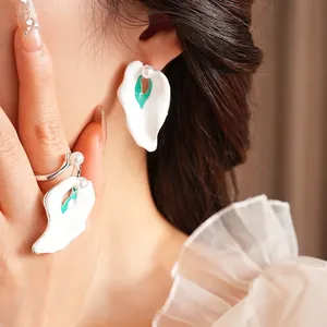 Vintage enamel petal floral jewelry set with pearls including earrings and matching ring