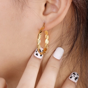 Gold-plated titanium steel hoop earrings with textured twisted rope design for women