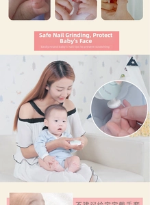 Detail of baby electric nail trimmer showing safe grinding heads and macro view of device