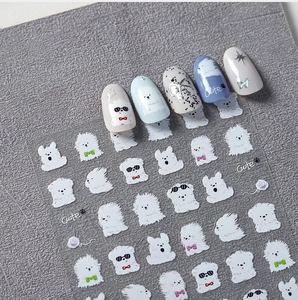 Detail of 5D cartoon puppy nail stickers with cute dog patterns for DIY manicure
