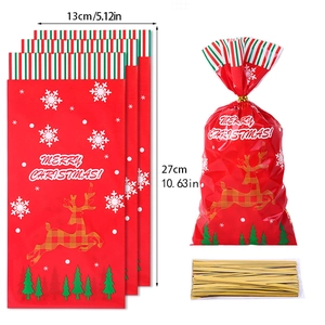 Christmas cellophane treat bags with reindeer and snowflake patterns and gold twist ties