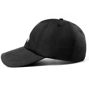 Quick-dry breathable black baseball cap with white side lettering for outdoor sun protection