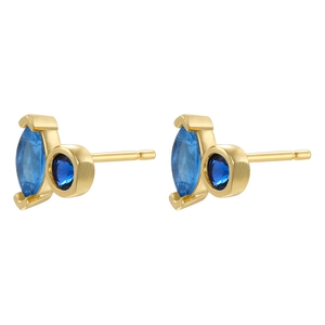 Detail of 18K gold plated stud earrings with marquise and round blue gems in bezel setting