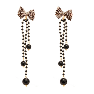 Leopard bow earrings with long black beaded tassels and elegant gold accents