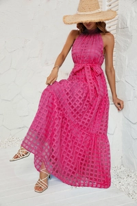 Detail of rose red checkered halter maxi dress with ruffled tiers and waist bow tie