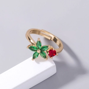 Adjustable gold flower ring with marquise green petals and red zircon stone