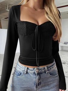 Y2K style black lace long sleeve top with front tie-up detail and slim fit design