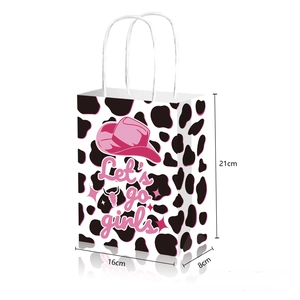 Detail showing cow print paper gift bag dimensions 21x16x8cm with pink cowboy hat design