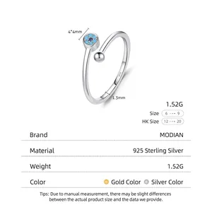 S925 sterling silver open ring featuring a blue turquoise evil eye and minimalist beads
