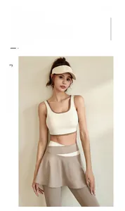Close-up of a high-elastic racerback sports bra and pleated yoga skort in beige